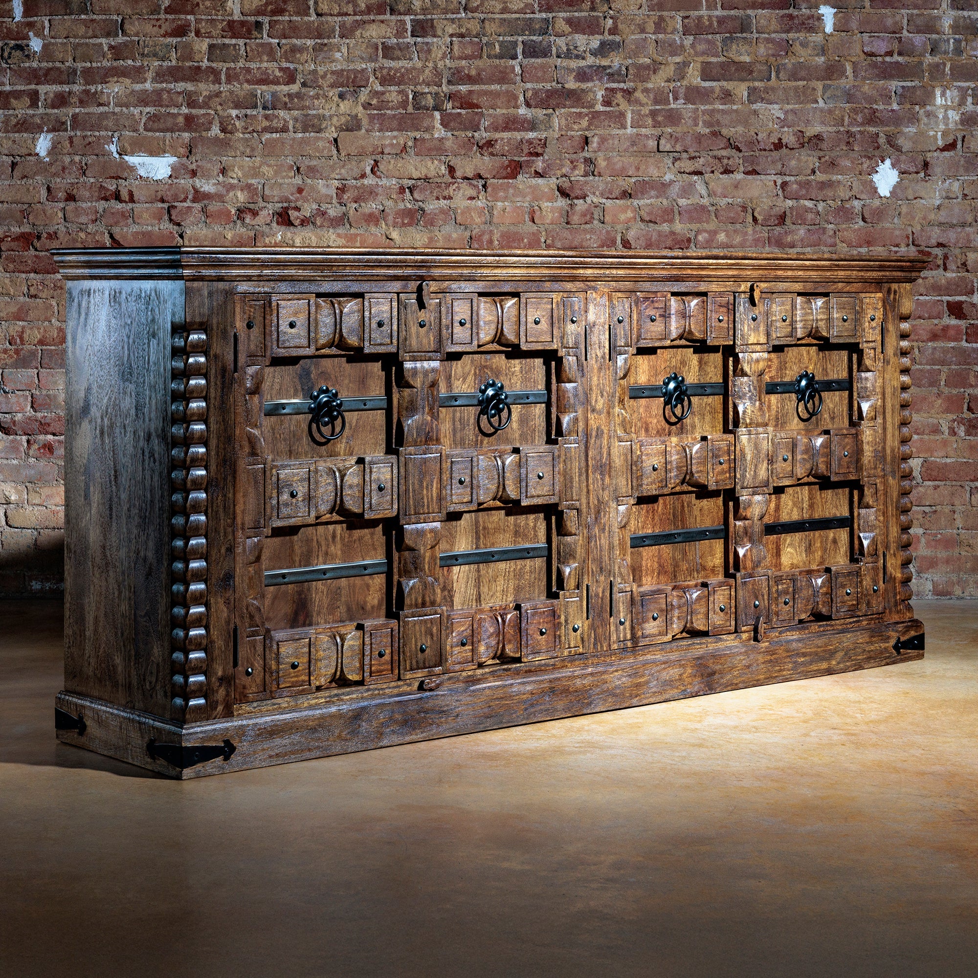 Handcrafted Western buffet made of reclaimed wood with turquoise accents and forged-iron hardware – rustic sideboard for ranch homes.
