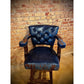 Add a touch of western flair to any room with the Blue Acid Croc Chisum Barstool. The acid wash croc accent cowhide and navy leather provide a unique and stylish look. With its comfortable design, this barstool is perfect for lounging or entertaining.
