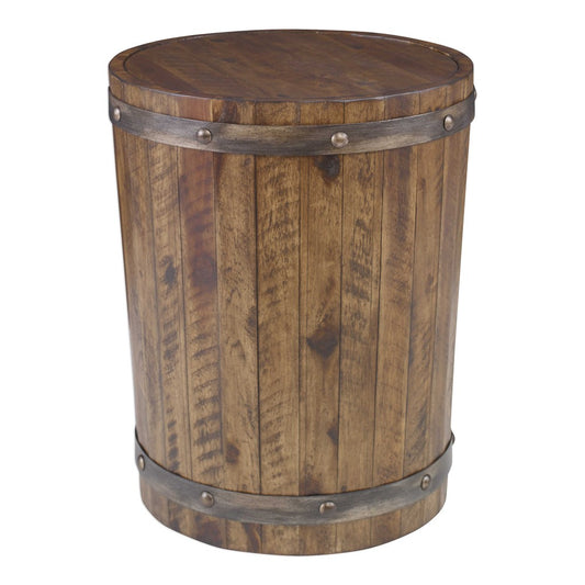 The Ceylon Side Table epitomizes rustic charm. It is constructed with solid distressed acacia wood and finished in a weathered walnut stain, reinforced with sheet metal strapping and burnished brushed steel rivets. This timeless piece is perfect for adding a touch of style and character to any living space.