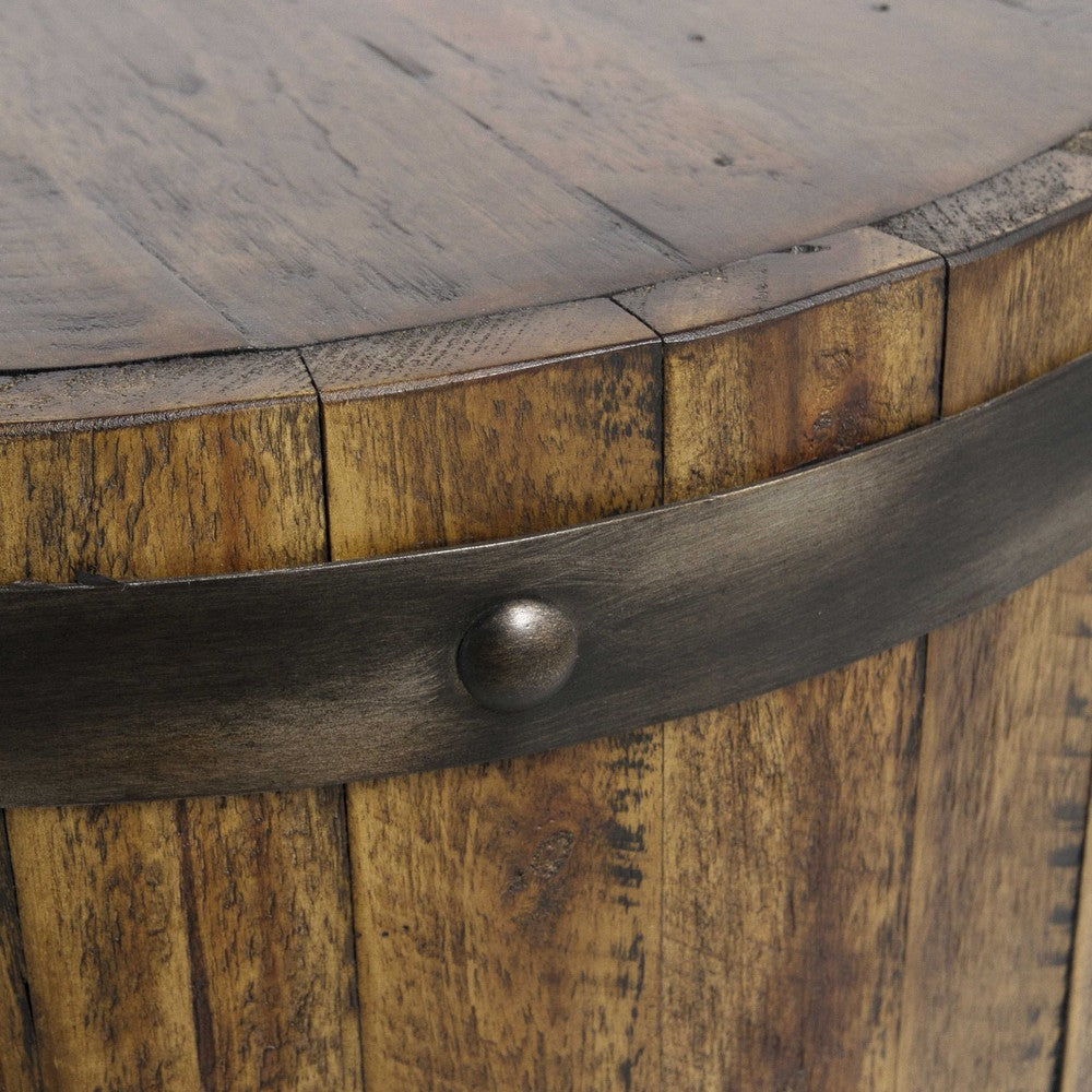 The Ceylon Side Table epitomizes rustic charm. It is constructed with solid distressed acacia wood and finished in a weathered walnut stain, reinforced with sheet metal strapping and burnished brushed steel rivets. This timeless piece is perfect for adding a touch of style and character to any living space.