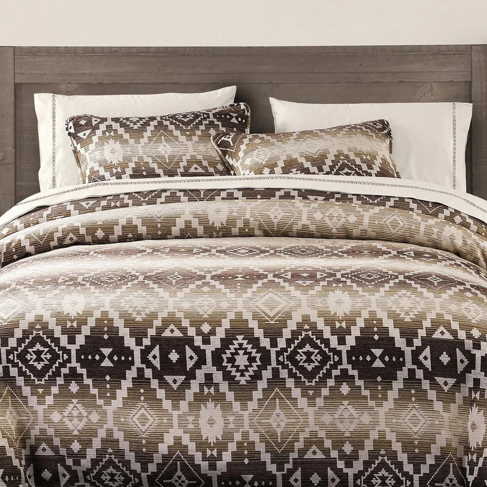 Experience the perfect balance of modern style and cozy comfort with the Chalet Aztec Comforter Set. With its luxuriously plush chenille and striking geometric design, it's sure to elevate any bedroom. This set features an earthy palette that blends well with various decor styles. Make a statement in any room with the Chalet Aztec Comforter Set.