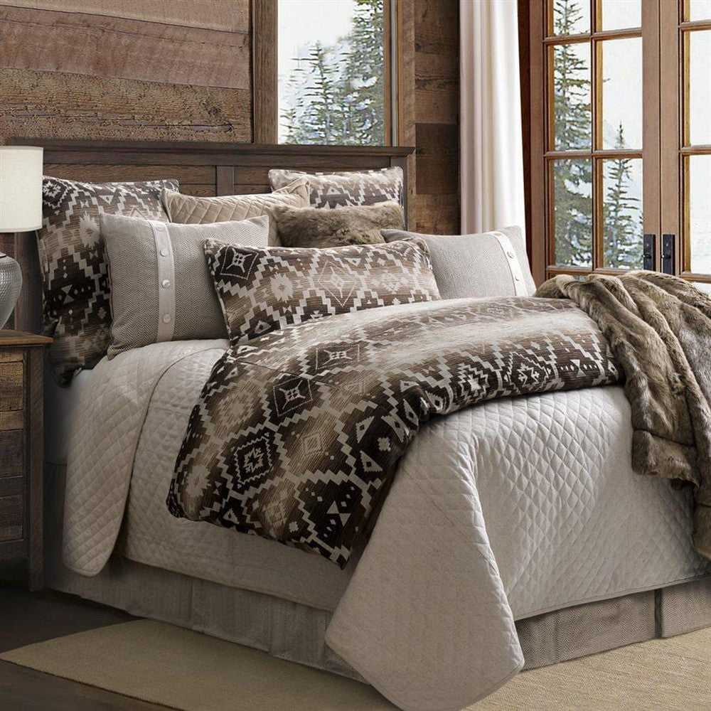 Experience the perfect balance of modern style and cozy comfort with the Chalet Aztec Comforter Set. With its luxuriously plush chenille and striking geometric design, it's sure to elevate any bedroom. This set features an earthy palette that blends well with various decor styles. Make a statement in any room with the Chalet Aztec Comforter Set.