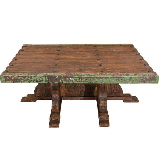 This stylish coffee table is made of reclaimed wood and features carefully wrapped copper edges, adding an elegant touch to any living space. The mix of textures creates a unique statement piece that can easily become the centerpiece of any room.