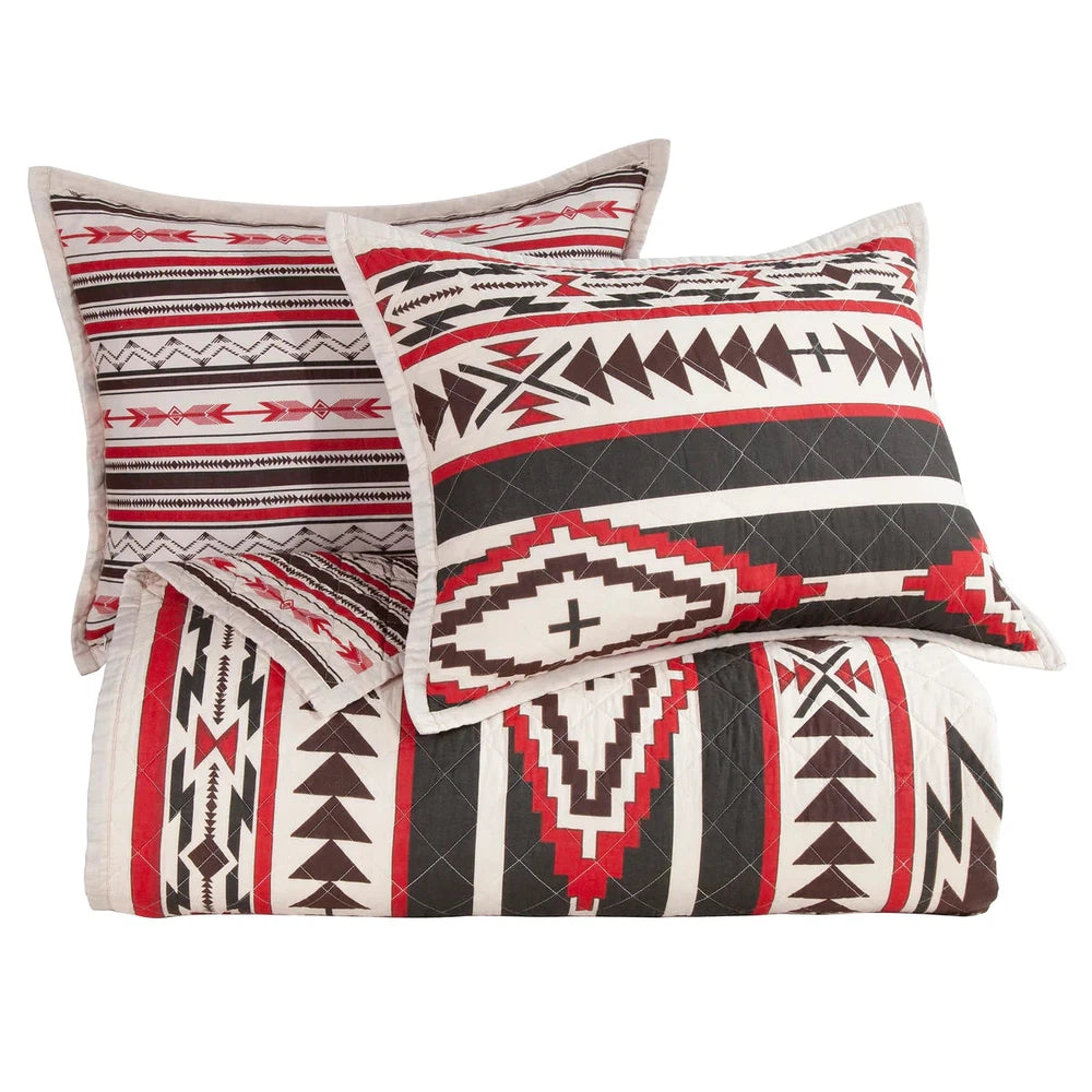 The Cortez Quilt Set is the perfect way to bring excitement to your bedroom. Inspired by iconic Western scenes, the bold crimson, black, and neutral tones create a vivid geometric pattern that stands out against any decor. Crafted with soft cotton filling, you can relax in comfort while still experiencing a splash of adventure. Reversible for easy transitioning, refresh your sleeping space with a simple flip of the quilt.