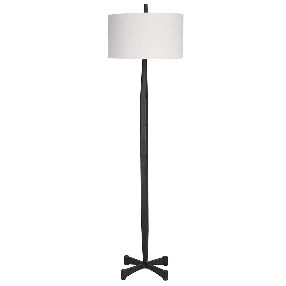 This classic metalwork inspired table lamp is perfect for any industrial decor. Constructed with a tapered base and aged black finish, its subtle rust distressing adds an authentic vintage touch. Enjoy the perfect ambiance when you turn on the Counteract Table Lamp.
