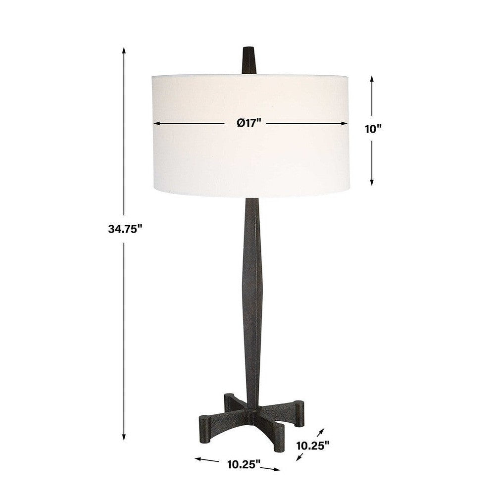 This classic metalwork inspired table lamp is perfect for any industrial decor. Constructed with a tapered base and aged black finish, its subtle rust distressing adds an authentic vintage touch. Enjoy the perfect ambiance when you turn on the Counteract Table Lamp.