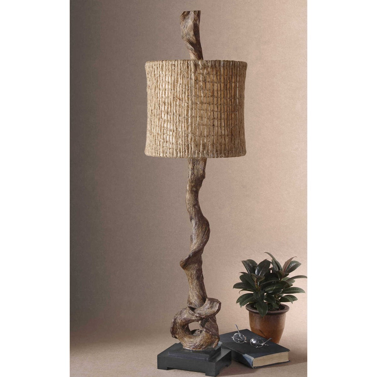 Weathered driftwood finish with a matching finial and a matte black base. The round drum shade is burlap twine with an open weave construction and a beige inner liner.