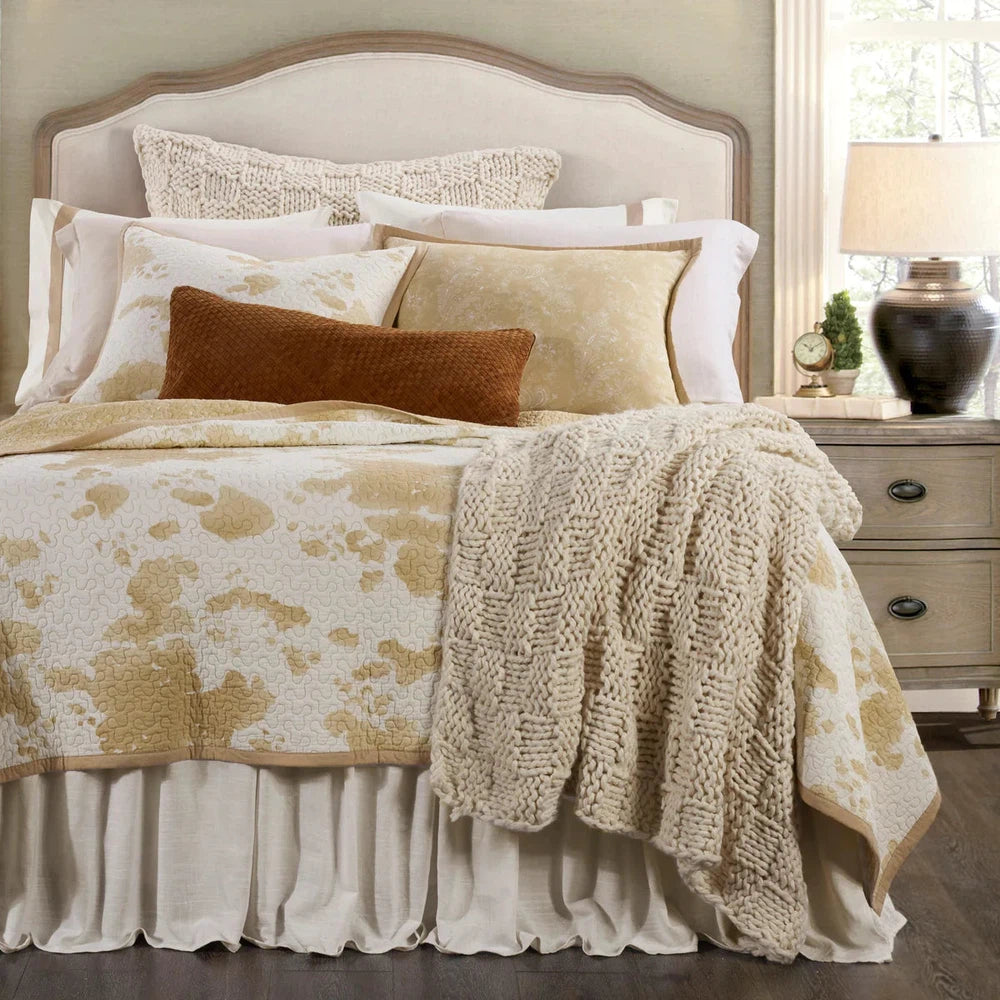 Bring the Wild West to your bedroom with the Elsa Quilt Set. Reversible cotton quilts feature a charming ranch print to add a touch of rustic flair. The collection also includes cowhide-print sheets, Euro shams in luxe leather, and coordinating window treatments with fringe details. Create a warm and inviting atmosphere in your home with Elsa.