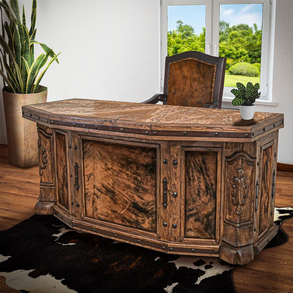 The Hand Carved Cowhide Desk brings elegance and sophistication to any room with its hand carved accent cowhide panels and stone top. Perfect for a modern home office, this timeless piece has been crafted with precise attention to detail and offers reliable stability without compromising on style.
