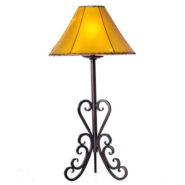 This generous and unique hand-forged iron table lamp is an excellent addition to any home. The rustic design gives it a timeless and classic look, making it a statement piece for any room. It is crafted with care from high-quality materials that will last for years.