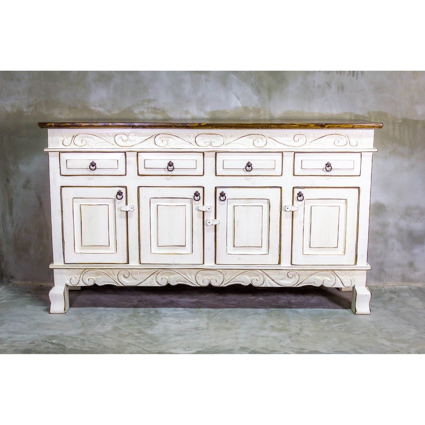 This Regency Buffet is crafted with hand-carved solid wood and features doors and drawers for ample storage. Finished in a distressed turquoise hue, it adds an elegant touch to any dining area.