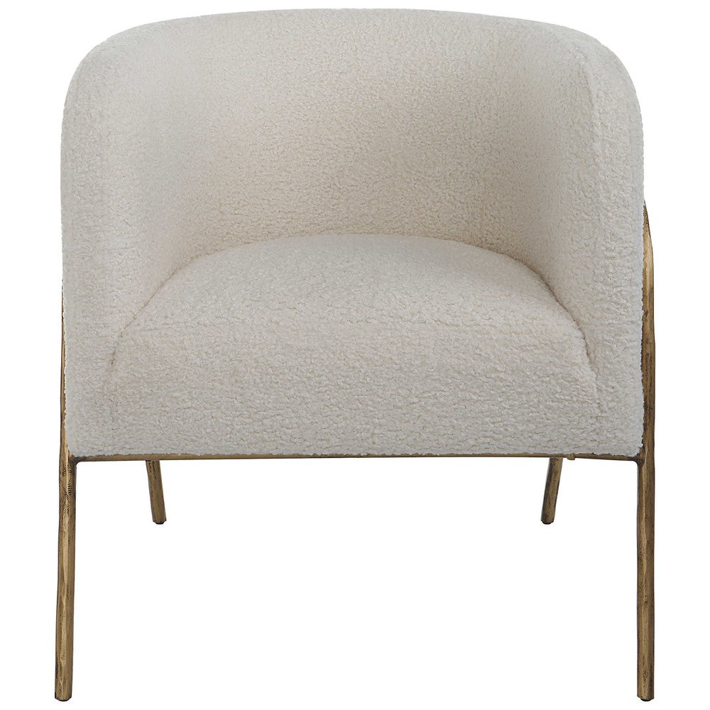 Introduce artful style to your home with the Jacobsen Accent Chair. Boasting an inspired Scandinavian design, the chair boasts an exquisite curved, aged gold finished iron frame and a luxurious off-white faux shearling seat, creating a timeless look to suit any living space. The perfect seat for curling up in, the chair is complete with a 19" seat height.
