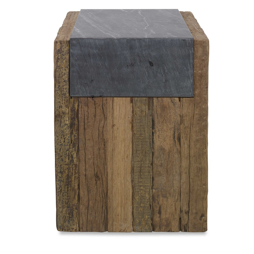 The Jonah Side Table is a unique fusion of rustic and refined. Crafted from naturally-stained reclaimed pine and topped with honed black marble, this piece is sure to add character to any room. Its variegated marbling and veining give it a truly distinctive look, while its solid wood construction ensures a lifetime of stability that will only improve with age.