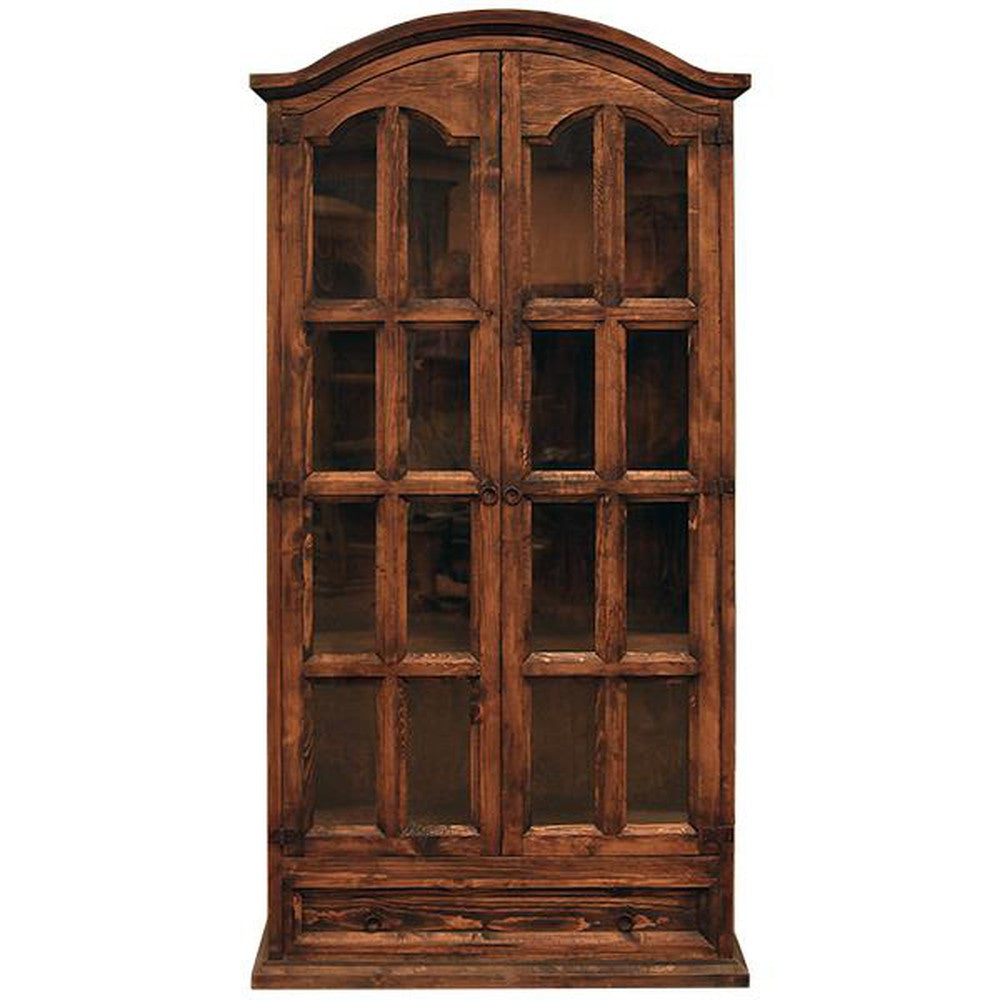 The Medio Curio Cabinet is an ideal storage solution for displaying valued items while keeping them secure. With its stylish dark finish and glass doors, it has an elegant and timeless look. Its sturdy construction ensures reliable protection for your treasured objects.