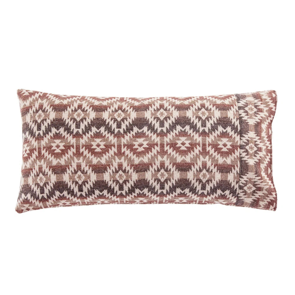 The Mesa Wool Blend Lumbar Pillowcase adds a traditional rustic charm to any space with its yarn-dyed cool earth tones and Southwestern-inspired design. Crafted with a wool blend and an intricate geometric motif, it offers a zipper-free self-cuff mechanism for easy style. Give your home a timeless feel with this classic piece.