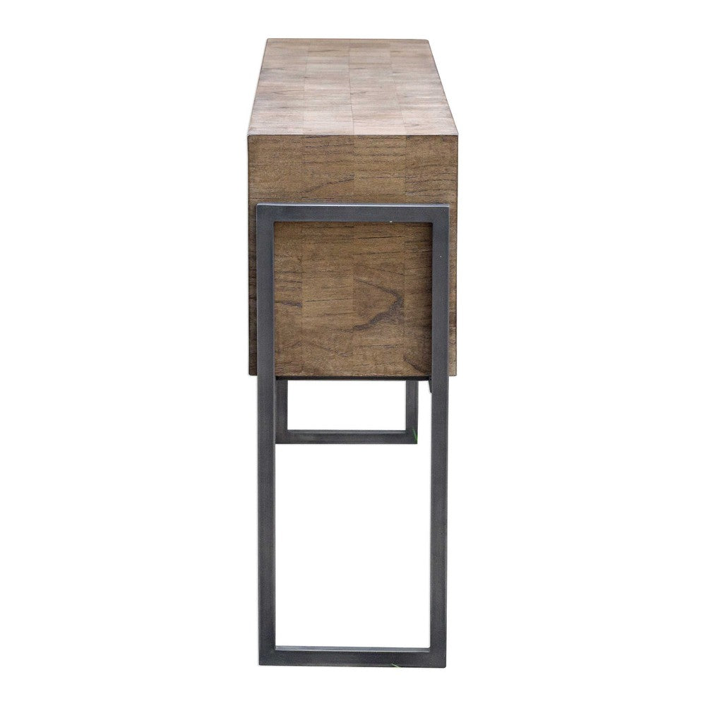 The Nevis Console is a beautiful contemporary piece, crafted from mahogany solids and mindi veneer in a hand-applied light oatmeal wash. The iron frame complements the layered veneer to create an attractive, unique grain pattern. Perfect for adding a touch of style to any interior.
