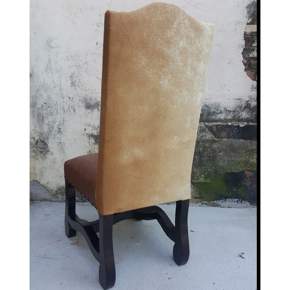 The Rancho Arroyo Aqua Dining Chair is the perfect addition to any dining space. Constructed with a timeless blend of authentic Pendleton fabric, top grain leather, and cowhide, this sophisticated chair will pair beautifully with any dining table. Its classic aesthetic and durable materials make it an enduring piece of furniture.
