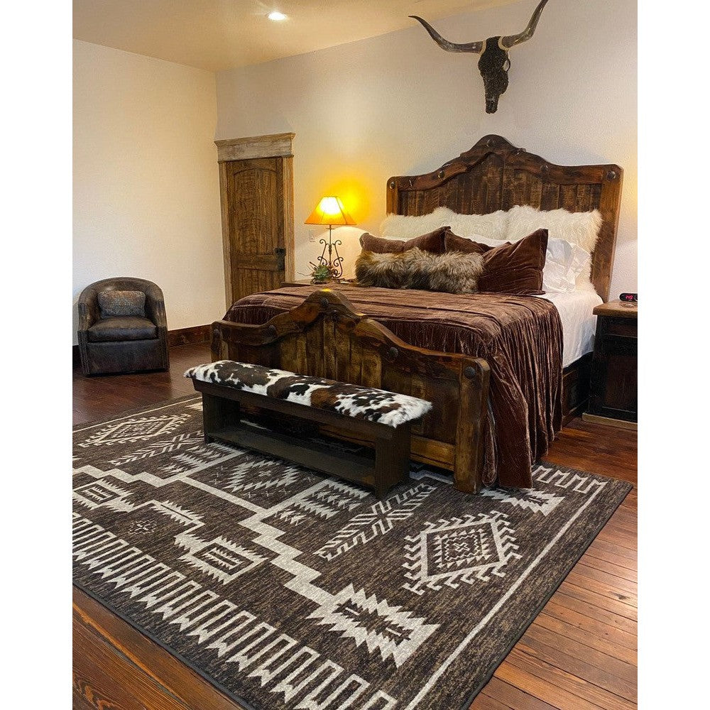 Sleep in style with the ultimate rustic-chic statement piece - the Rancho Bed. Crafted from durable reclaimed wood, this bed features an arched top with hammered nailhead accents for an authentic rustic look and feel. Perfect for adding a timeless touch to your bedroom.