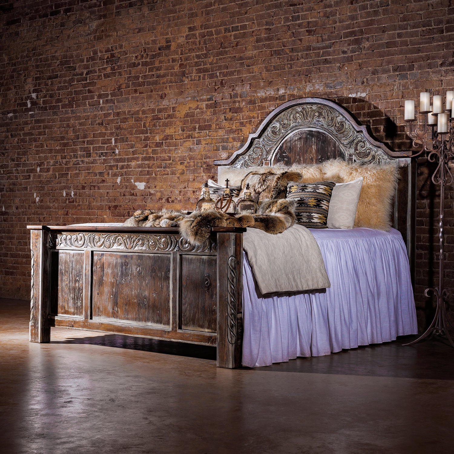 Refined western wood bed frame with paneled headboard in a softly lit bedroom