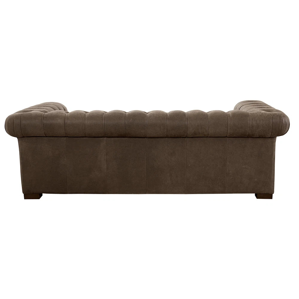 This luxurious Selleck Sofa features a sturdy hardwood frame, pocketed coil seating for comfort, panel key arm and button tufted design. Upholstered in supple top grain leather all over, its design is suitable for both western and contemporary decor. Experience sumptuous comfort with the Selleck Sofa.