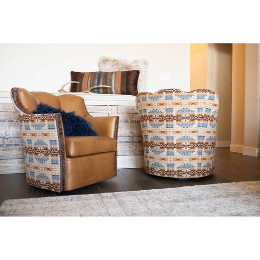 The Shonto Conch Chair offers comfort and luxury, featuring top grain leather, Pendleton fabric, and embossed leather trim. Its generous size and 360-degree swivel make it perfect for any living area. Enjoy a luxurious seating experience with the Shonto Conch Chair.