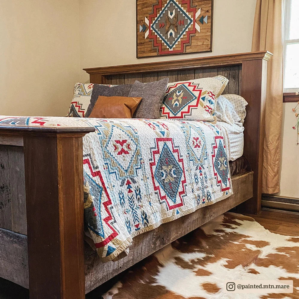 Bring a vibrant Southwestern touch to your bedroom with the Spirit Valley Quilt Set. Crafted in a palette of red, teal, taupe, and navy against a vintage white background, the Aztec-inspired pattern is reversible for an elegant and classic alternative. Enjoy the perfect balance of style and comfort.