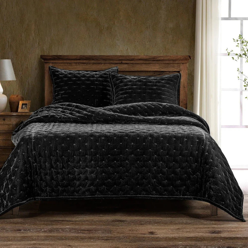 Our Stella Velvet Quilt brings a luxurious sheen to your bedding with its rich faux silk velvet fabric. The quilted design provides subtle texture, while its selection of neutral and vibrant jewel tone colors will fit seamlessly into your home's traditional, Western, or rustic décor. Enjoy its soft, sumptuous feel and complete the look by pairing it with other pieces from the Stella Collection.