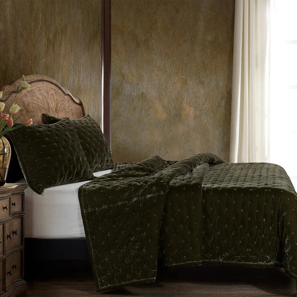 Our Stella Velvet Quilt brings a luxurious sheen to your bedding with its rich faux silk velvet fabric. The quilted design provides subtle texture, while its selection of neutral and vibrant jewel tone colors will fit seamlessly into your home's traditional, Western, or rustic décor. Enjoy its soft, sumptuous feel and complete the look by pairing it with other pieces from the Stella Collection.