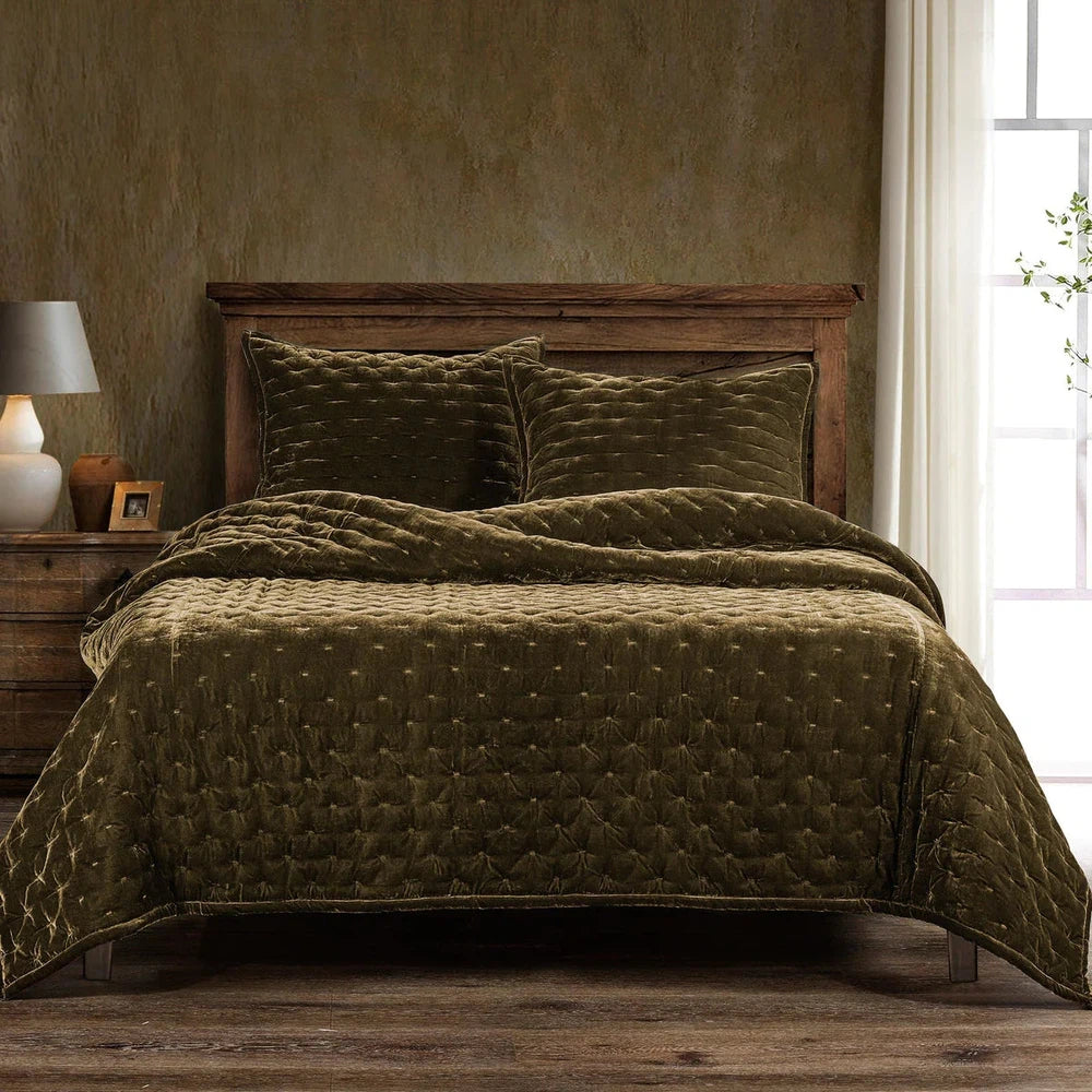 Our Stella Velvet Quilt brings a luxurious sheen to your bedding with its rich faux silk velvet fabric. The quilted design provides subtle texture, while its selection of neutral and vibrant jewel tone colors will fit seamlessly into your home's traditional, Western, or rustic décor. Enjoy its soft, sumptuous feel and complete the look by pairing it with other pieces from the Stella Collection.