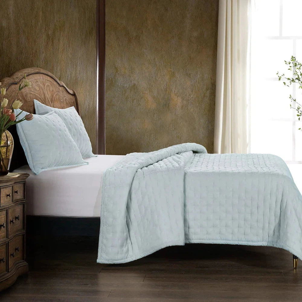 Our Stella Velvet Quilt brings a luxurious sheen to your bedding with its rich faux silk velvet fabric. The quilted design provides subtle texture, while its selection of neutral and vibrant jewel tone colors will fit seamlessly into your home's traditional, Western, or rustic décor. Enjoy its soft, sumptuous feel and complete the look by pairing it with other pieces from the Stella Collection.