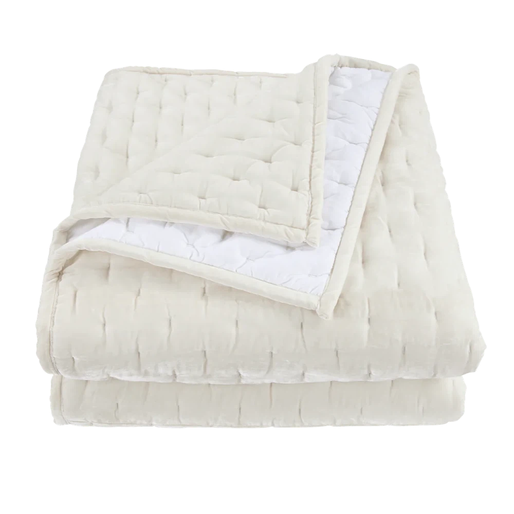 Our Stella Velvet Quilt brings a luxurious sheen to your bedding with its rich faux silk velvet fabric. The quilted design provides subtle texture, while its selection of neutral and vibrant jewel tone colors will fit seamlessly into your home's traditional, Western, or rustic décor. Enjoy its soft, sumptuous feel and complete the look by pairing it with other pieces from the Stella Collection.