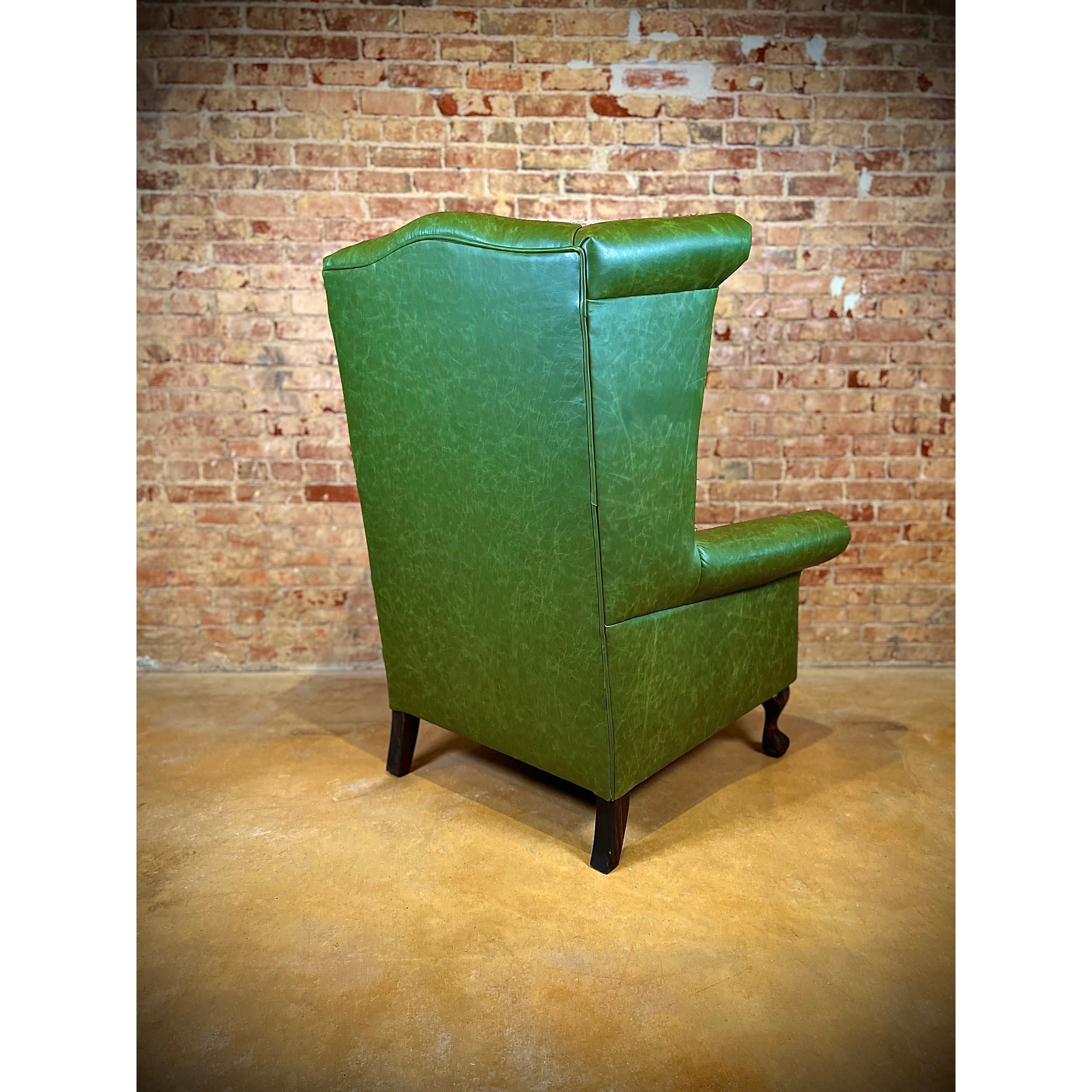 Crafted with top grain leather, the Stetson Leather Bootstitch Wingback Chair features a classic bootstitch design, elegant nailhead trim, and traditional rolled arms. Its sturdy claw foot adds durability and style to any room. Sit back and relax in this timeless and luxurious piece.