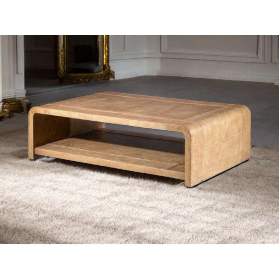 This Taylor Leather Coffee Table is both stylish and functional. Made with high-quality leather upholstery, this coffee table adds a touch of luxury to any room. The Western design offers a unique and elegant look. Upgrade your living space with this exquisite coffee table.