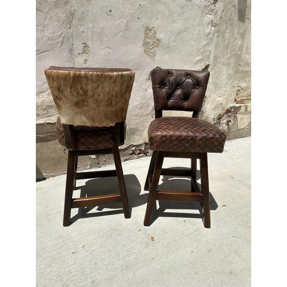 This swivel stool is designed for comfort and luxury, with a top-grain leather cushion and tufted back, perfect for your counter or bar. It comes with a cowhide back, and can be with arms or armless. Enjoy maximum comfort with this stylish, high-quality stool.