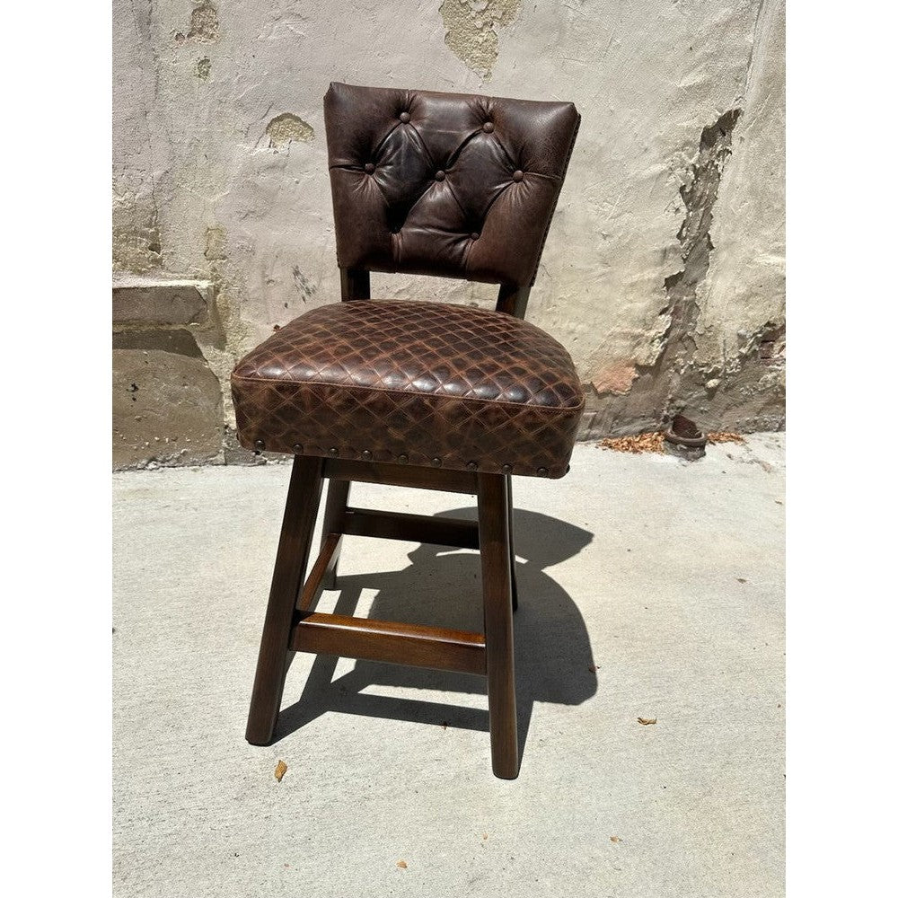 This swivel stool is designed for comfort and luxury, with a top-grain leather cushion and tufted back, perfect for your counter or bar. It comes with a cowhide back, and can be with arms or armless. Enjoy maximum comfort with this stylish, high-quality stool.