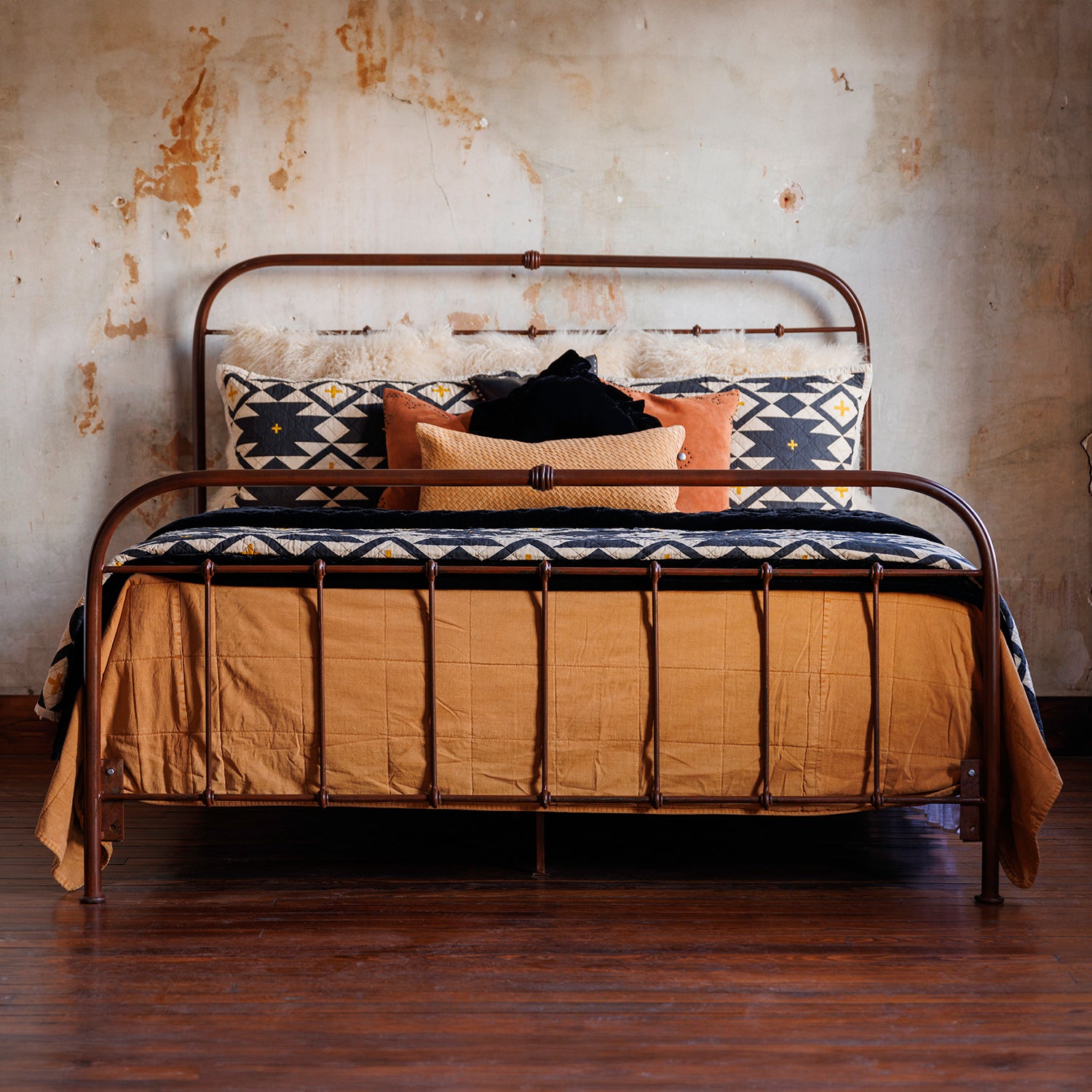 This Villa Hand Forged Iron Bed Frame showcases expert craftsmanship with its hand-forged iron details and rustic design. Order today!