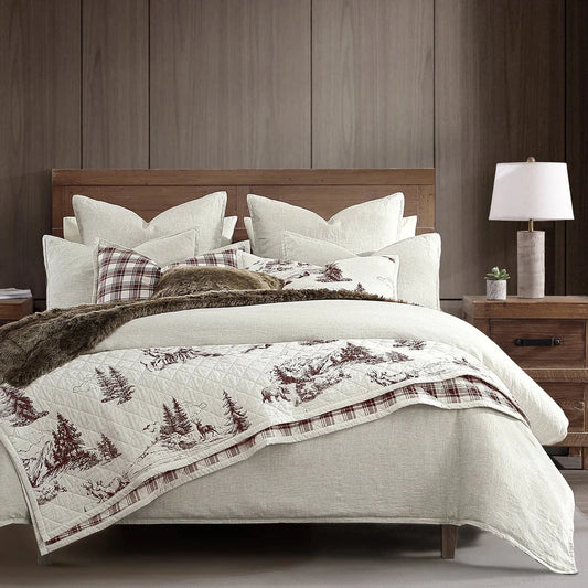 Transform your bedroom into an ode to American wilderness with the White Pine Quilt Set. Crafted from printed cotton, the reversible quilt features both a traditional French toile print and a contemporary plaid pattern, creating a classic design that won’t go out of style. With a subtle neutral base, this quilt set will blend into any décor, creating a space that celebrates the grandeur of the American landscape.