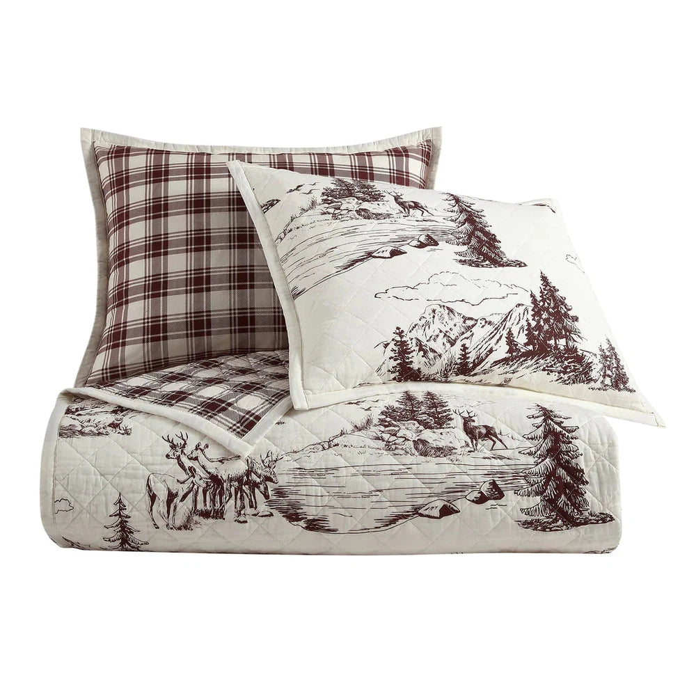 Transform your bedroom into an ode to American wilderness with the White Pine Quilt Set. Crafted from printed cotton, the reversible quilt features both a traditional French toile print and a contemporary plaid pattern, creating a classic design that won’t go out of style. With a subtle neutral base, this quilt set will blend into any décor, creating a space that celebrates the grandeur of the American landscape.