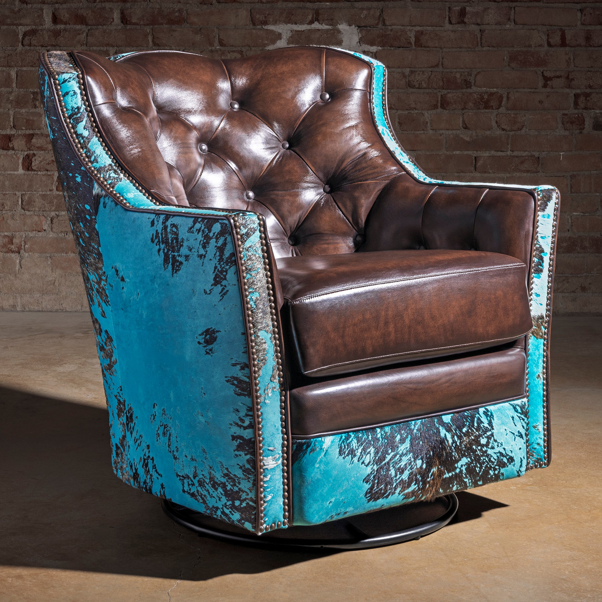 Azure Spur Tufted Western Swivel Chair western swivel chair with turquoise cowhide exterior, tufted leather back, and deep lounge seat.