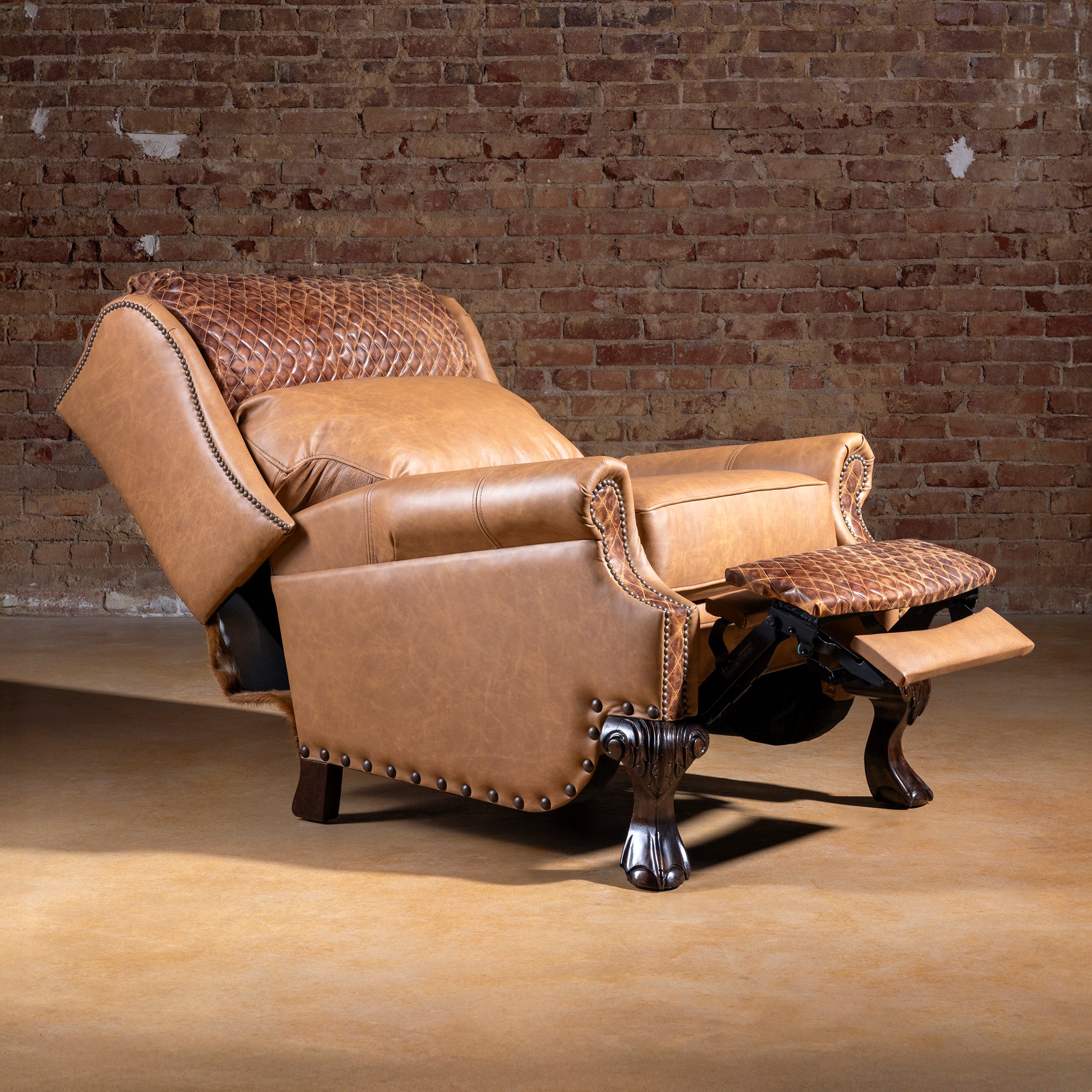 Bonanza Ranch Recliner fully reclined in premium leather and cowhide