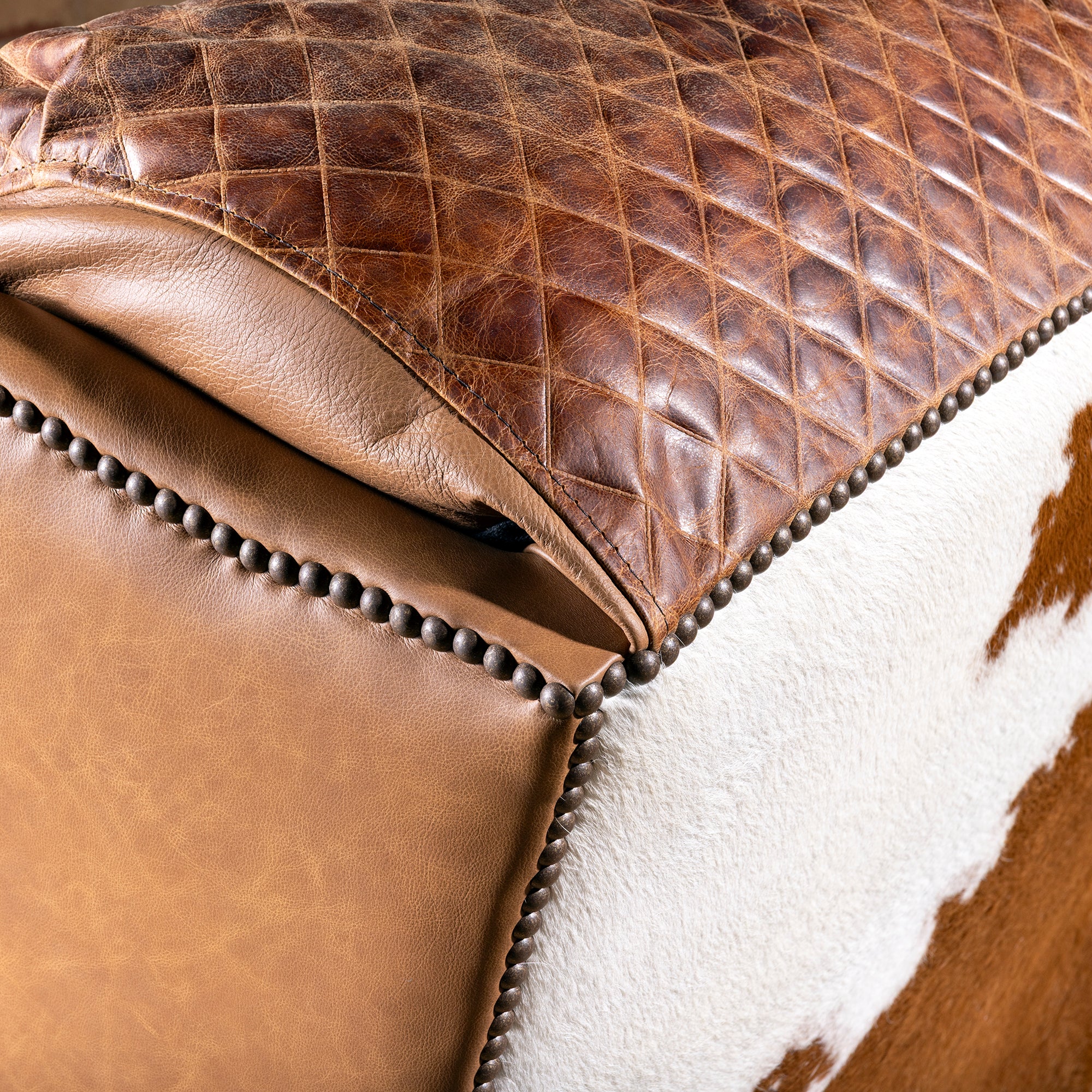 Close-up of premium top-grain leather craftsmanship on the Bonanza Ranch Recliner