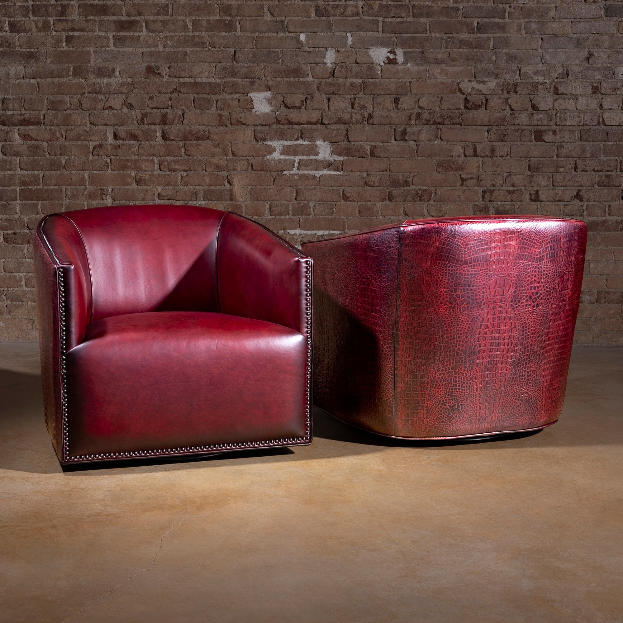 Bordeaux Croc Chair western swivel chair duo showing red leather interior and croc-embossed outer back with nailheads