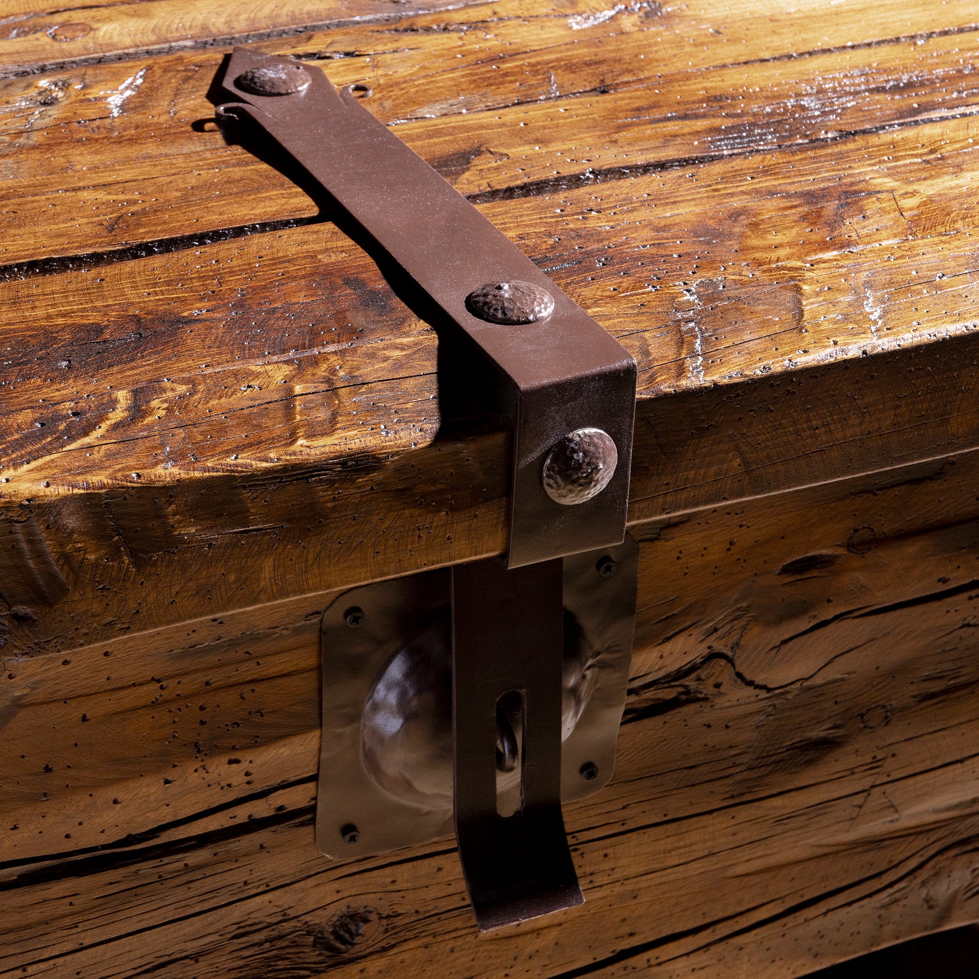 Bosque Timber Vault close view of hand-forged iron latch on reclaimed wood console front