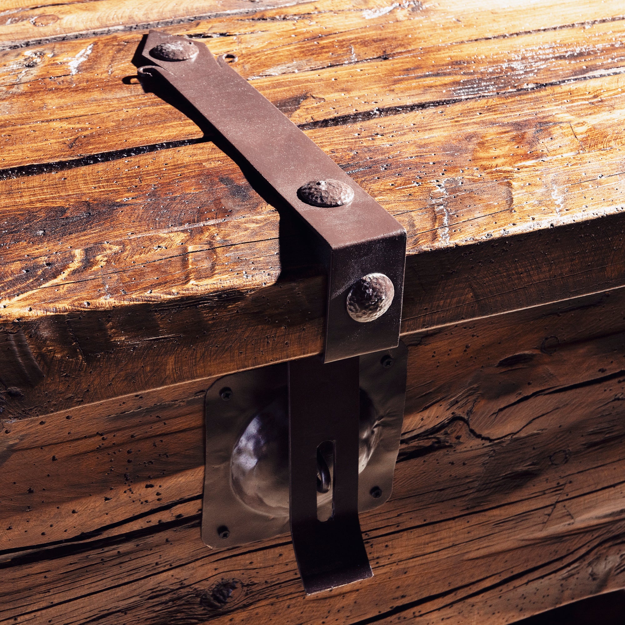 Bosque Timber Vault close view of hand-forged iron latch on reclaimed wood console front