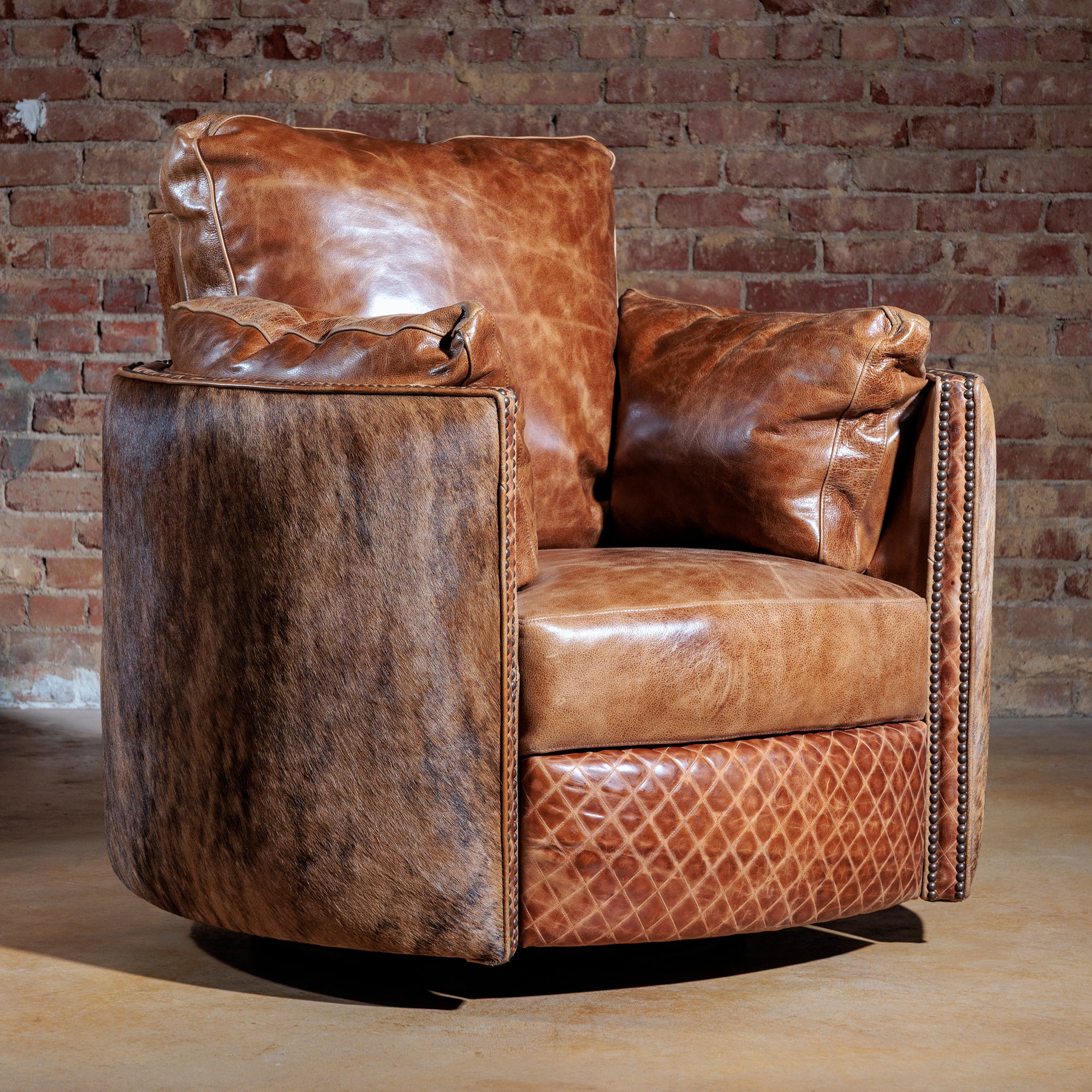 Front view of Dust Storm Western recliner chair with leather and brindle cowhide