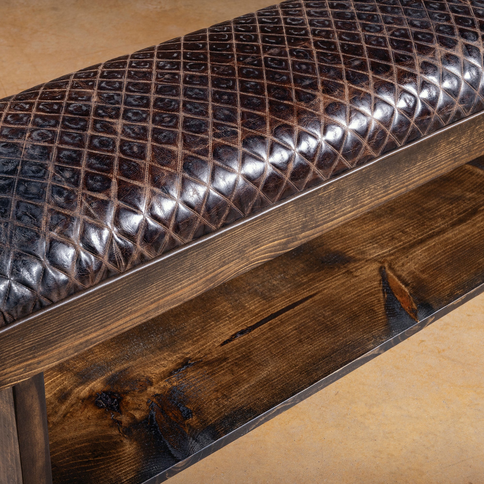 Detail of leather texture and stitching on Iron River Bench seat