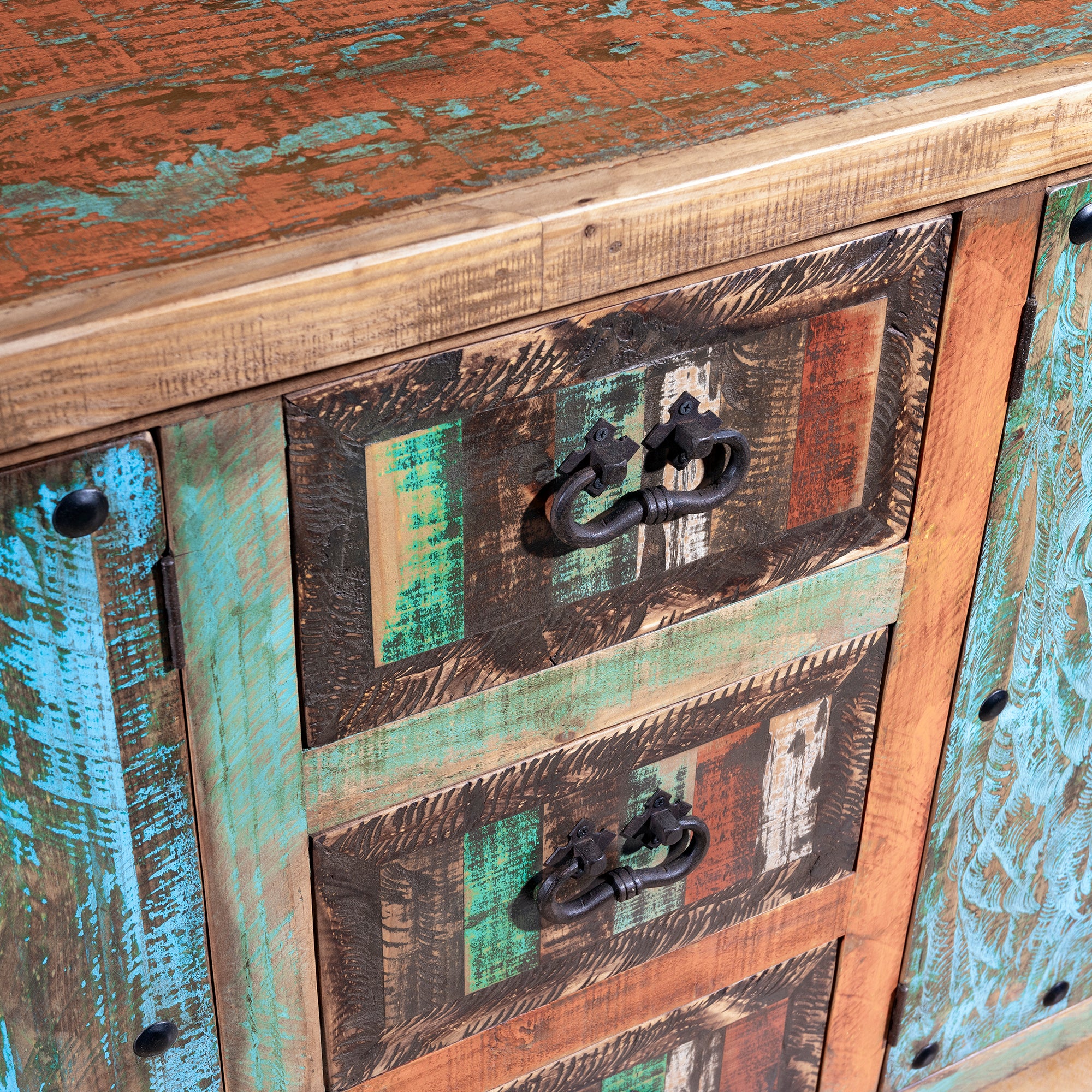 Close-up of Canyoncrest Patina Buffet drawers with layered turquoise, green, and rust patina