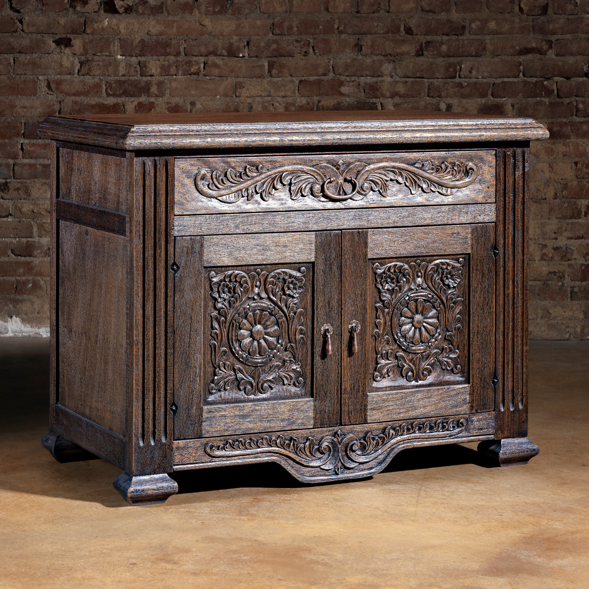 Hand-carved Western nightstand with rosette doors, antique dark wood finish, and forged iron pulls