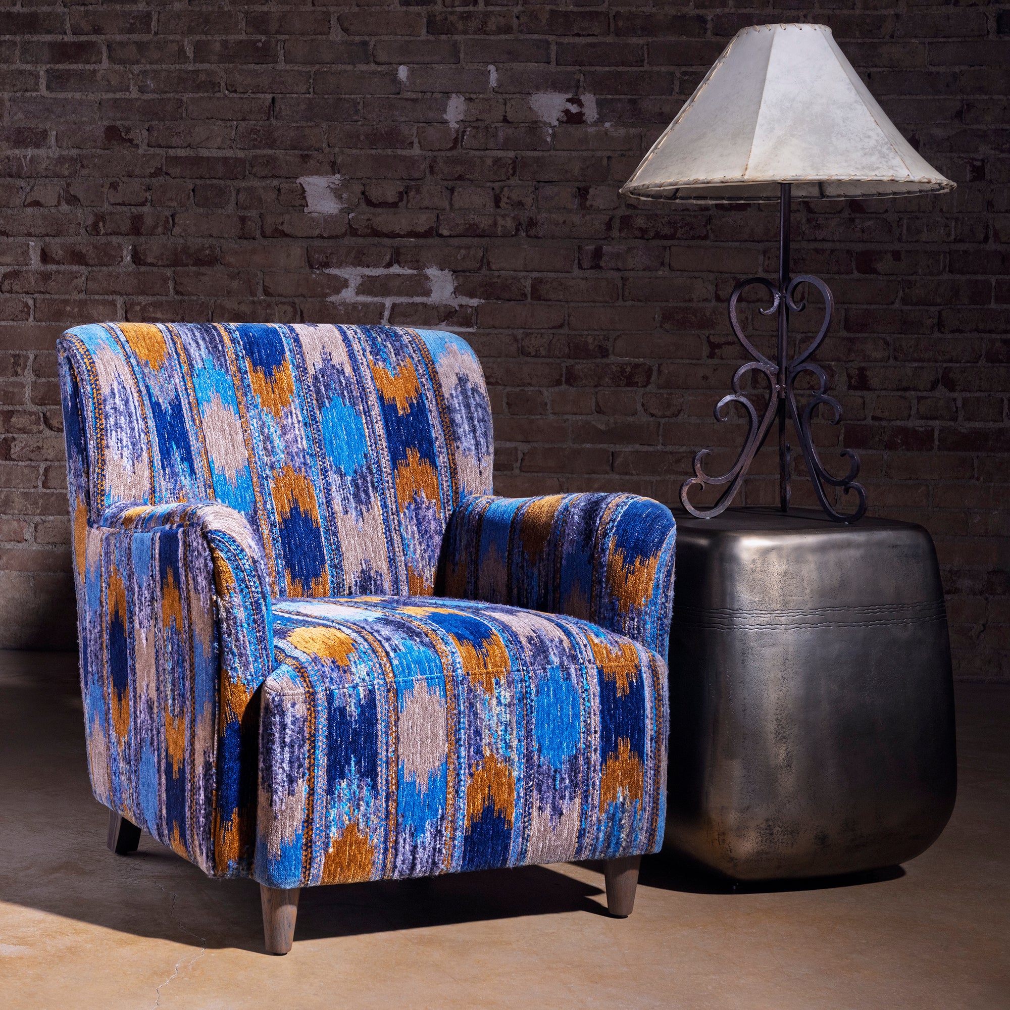 Styled scene featuring Cerulean Chimayo patterned accent chair in a Western interior