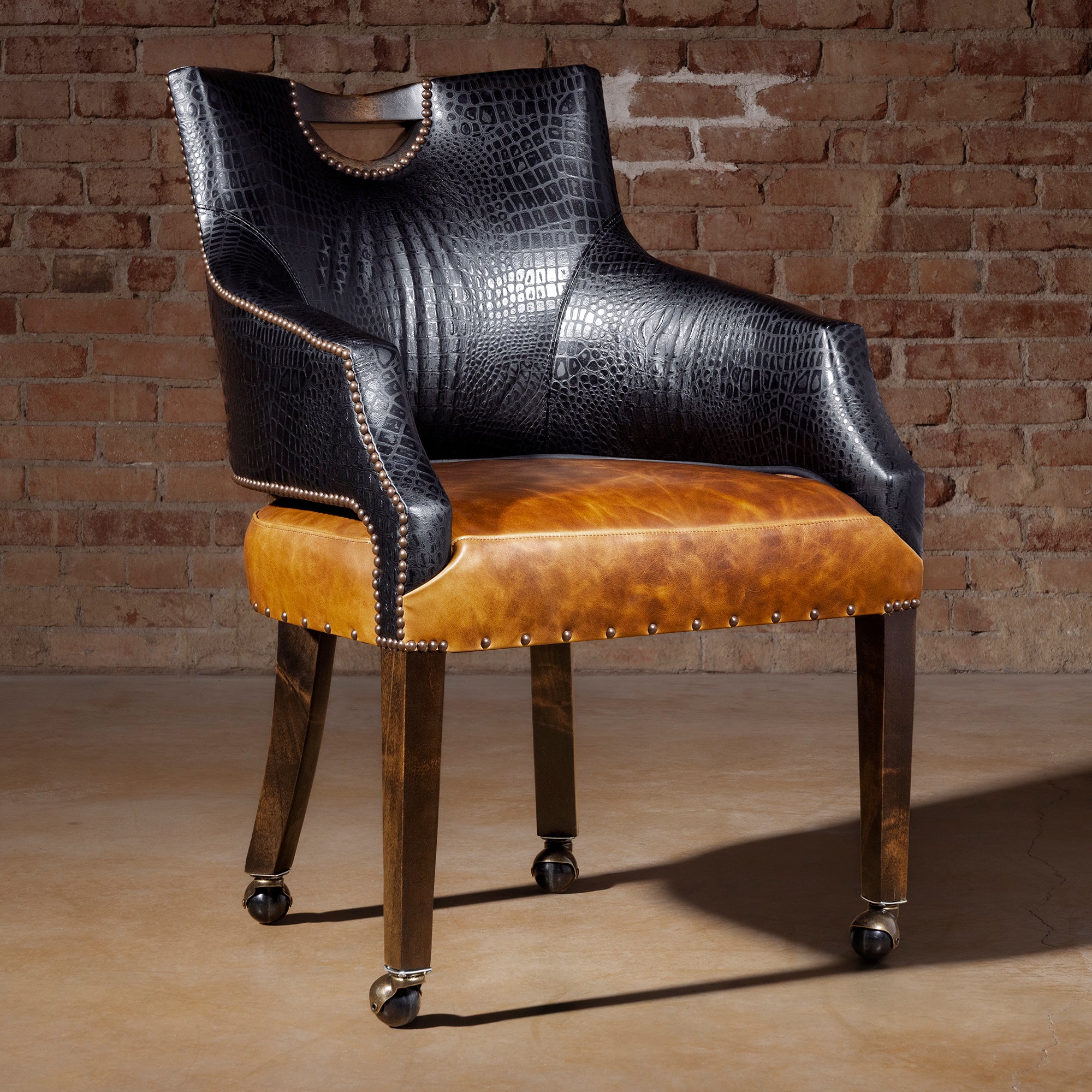 Luxury Western poker chair with black croc-embossed leather and saddle top-grain leather seat on casters